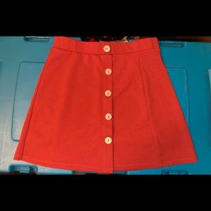 Orange, fitted skirt